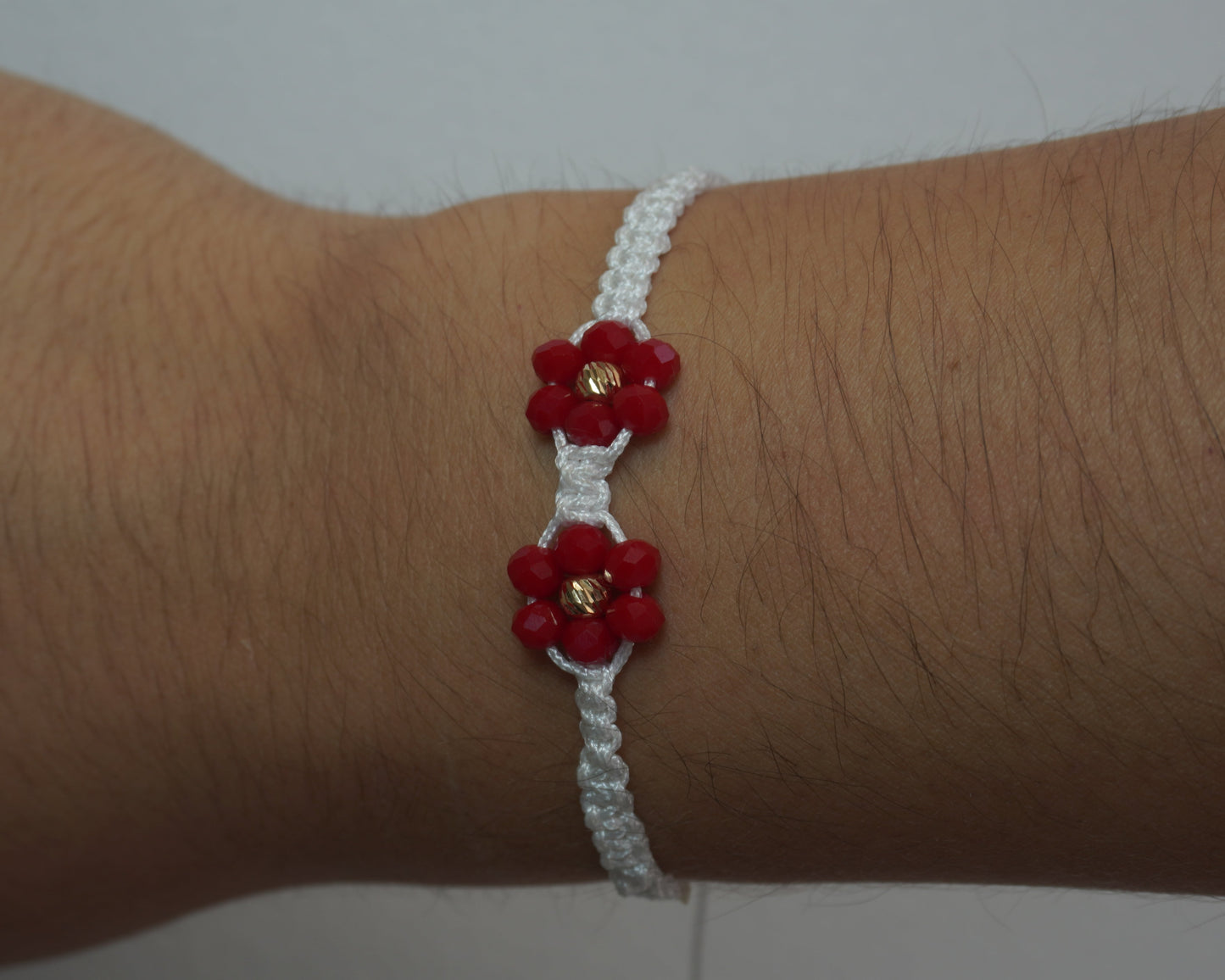 Pulsera Tejida Flores Oro 18K