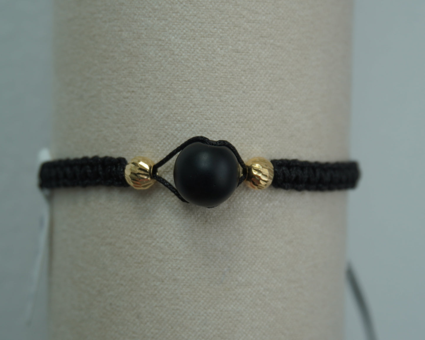 Pulsera Tejida Esencia Negra Oro 18K