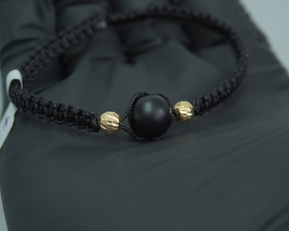 Pulsera Tejida Esencia Negra Oro 18K