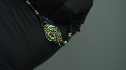 Pulsera tejida Corona Esmeralda Laminado