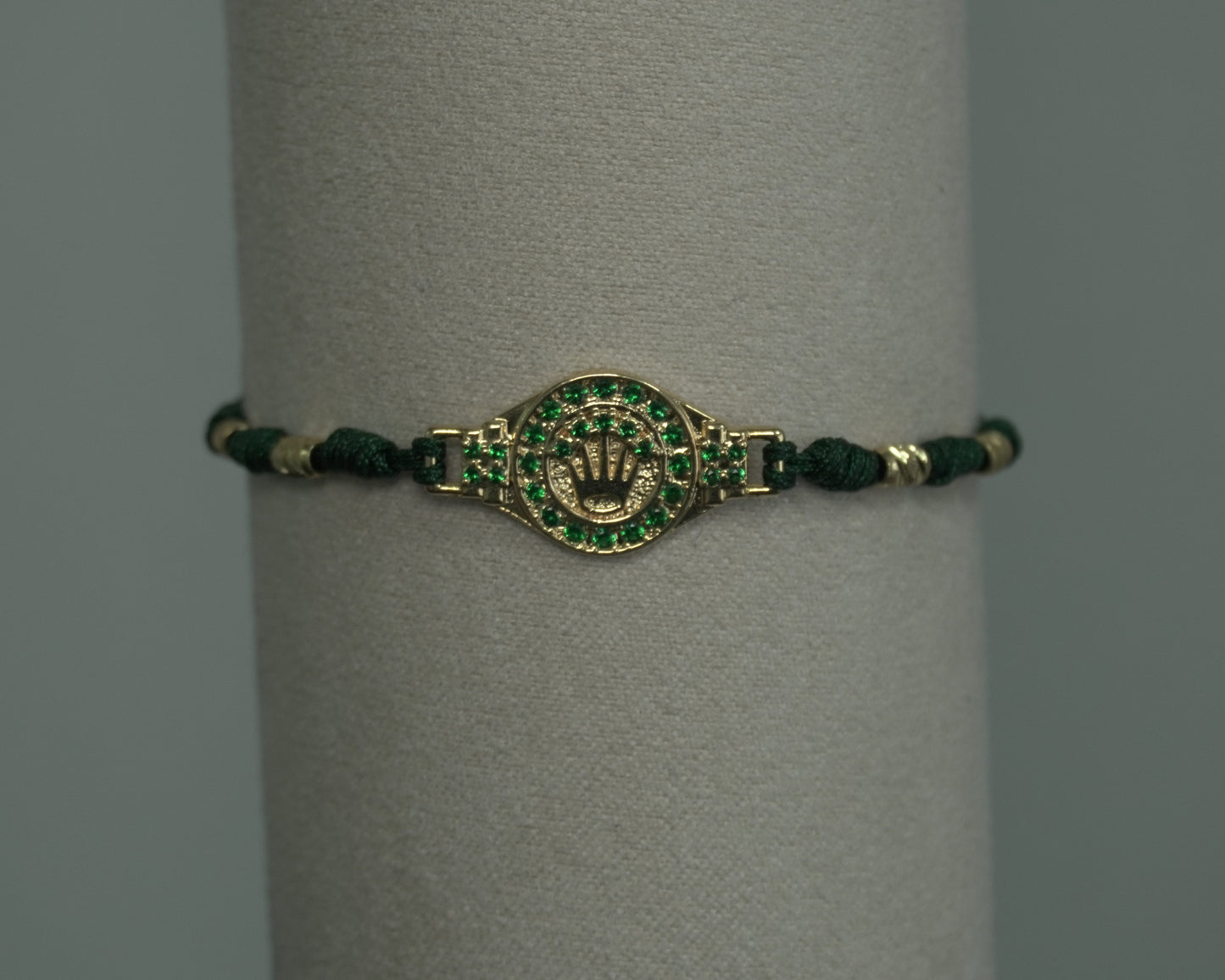 Pulsera tejida Corona Esmeralda Laminado