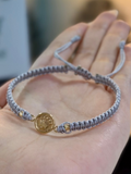 Manilla con 2 balin diamantado #3 y herraje corona Oro 18K