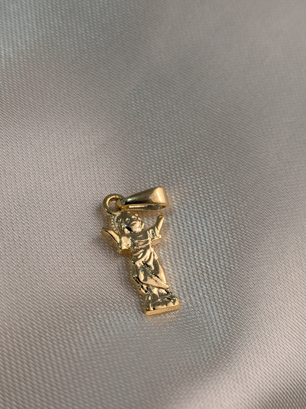 Dije Silueta Divino Niño Oro Laminado