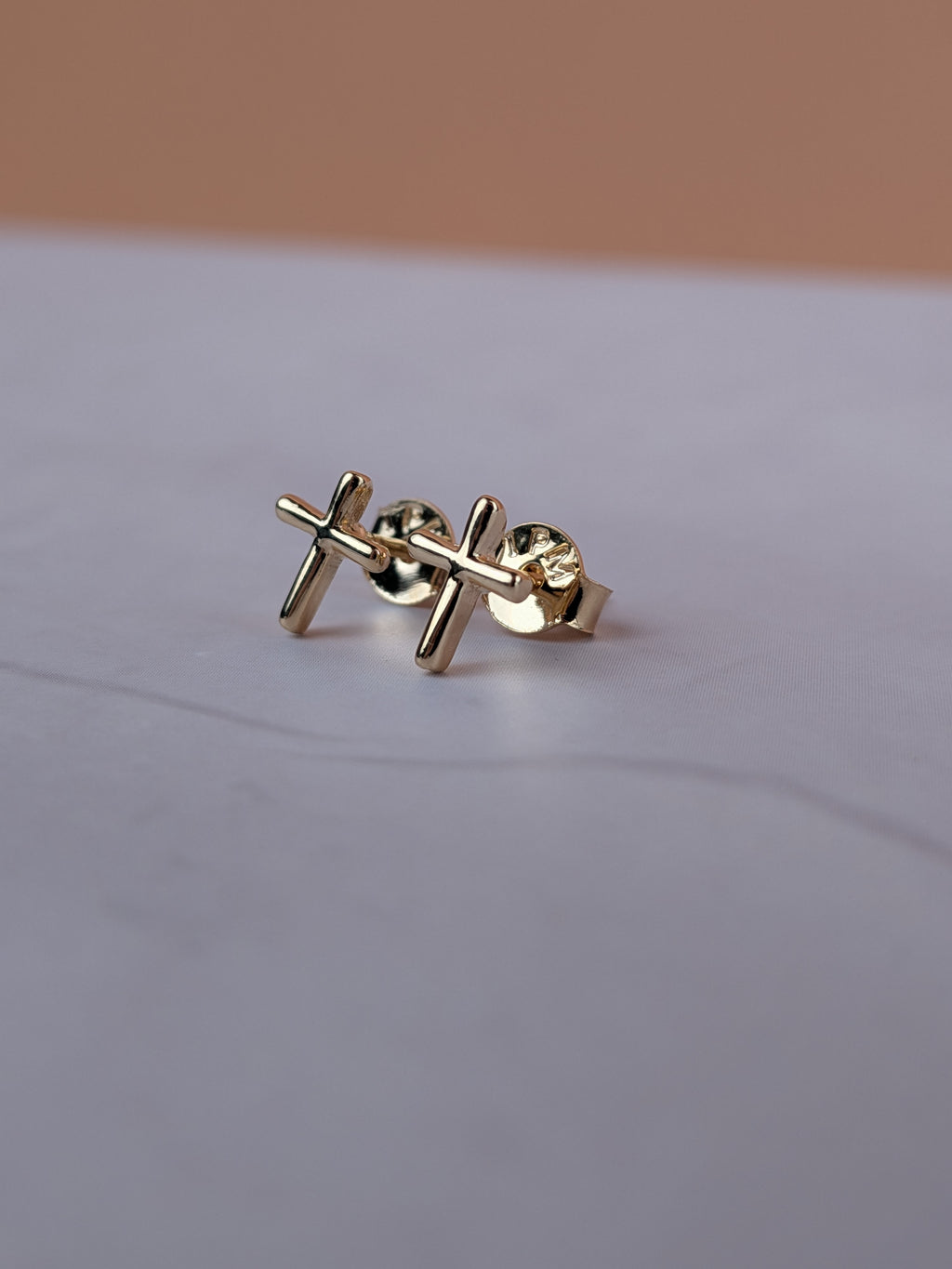 Arete Cruz Ortopédico Oro Laminado