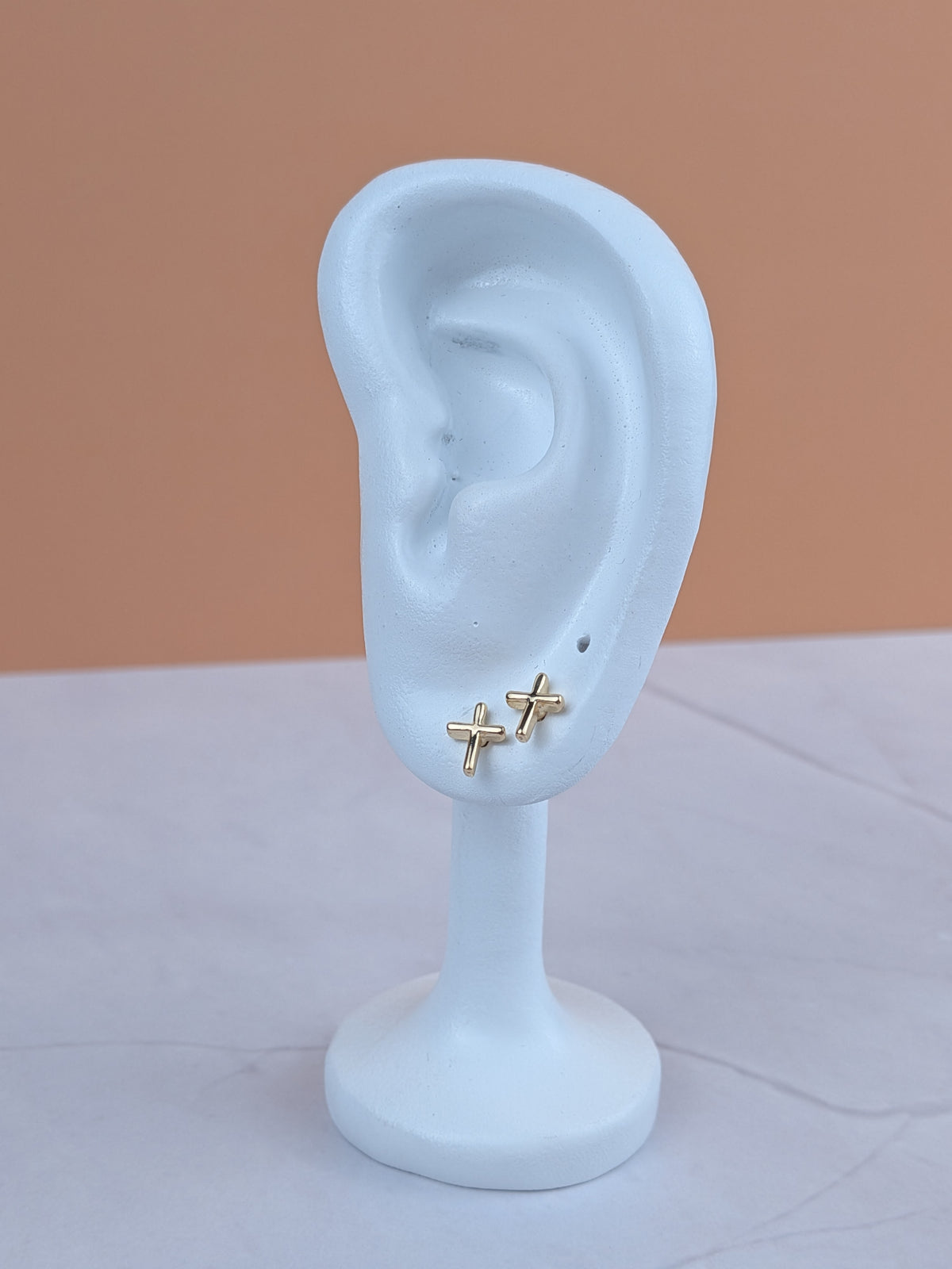 Arete Cruz Ortopédico Oro Laminado