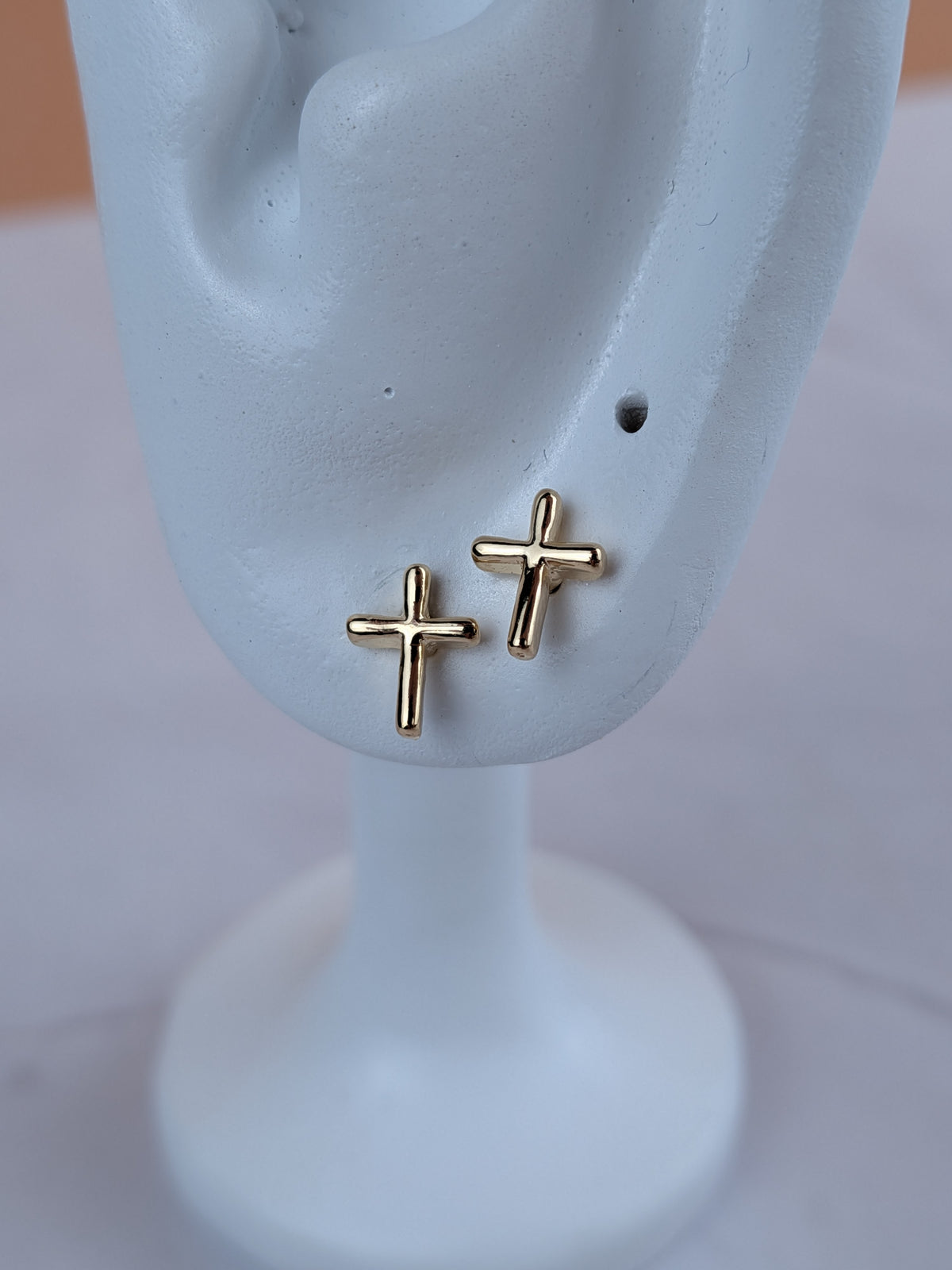 Arete Cruz Ortopédico Oro Laminado